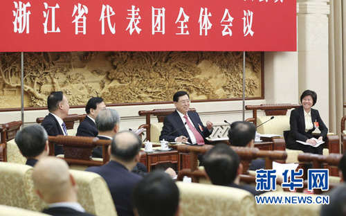 3月5日，中共中央政治局常委、全國人大常委會委員長張德江參加十二屆全國人大三次會議浙江代表團(tuán)的審議。新華社記者丁林?jǐn)z