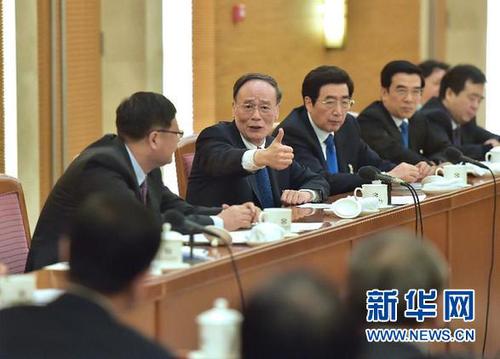 3月5日，中共中央政治局常委、中央紀委書記王岐山參加十二屆全國人大三次會議北京代表團的審議。 新華社記者 李濤 攝