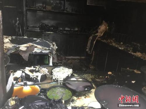 資料圖：浙江天臺縣“2·5”火災(zāi)現(xiàn)場滿屋狼藉。<a target='_blank' href='http://www.chinanews.com/'>中新社</a>記者 何蔣勇 攝