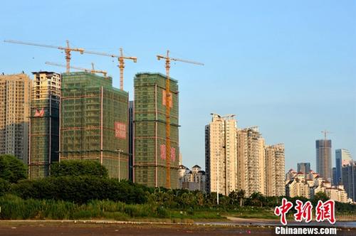 資料圖：正在建設(shè)中的房地產(chǎn)樓盤(pán)。<a target='_blank' href='http://www.chinanews.com/'>中新社</a>記者 張斌 攝