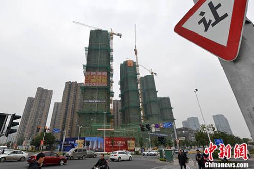 資料圖：福州一處商品房在建中。 <a target='_blank' href='http://www.chinanews.com/'>中新社</a>記者 呂明 攝